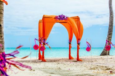 Beach orange wedding ceremony decor