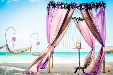 Beach purple wedding ceremony decor