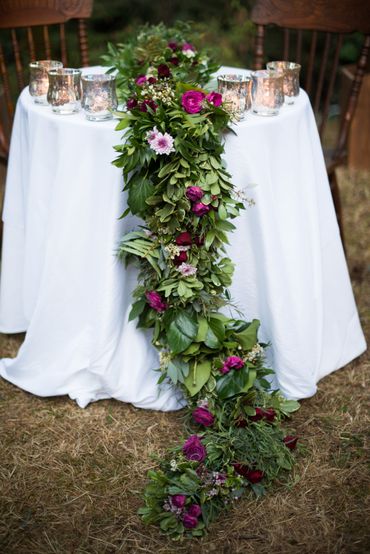 Outdoor green wedding floral decor