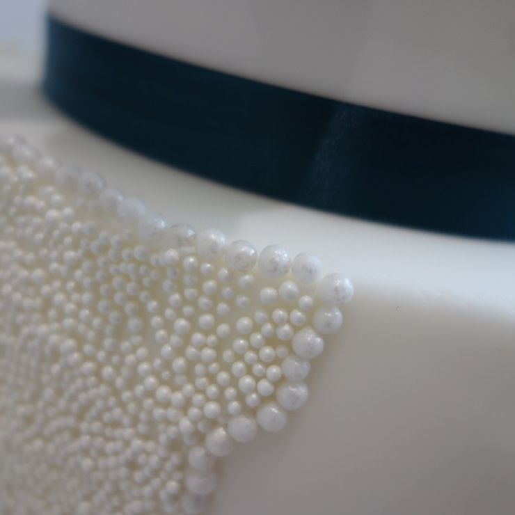 Teal and pearl wedding cake