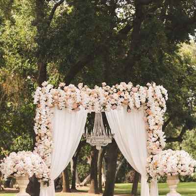 Ivory outdoor wedding ceremony decor