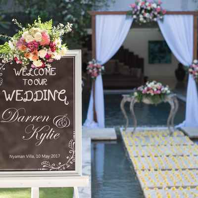 White outdoor wedding signs